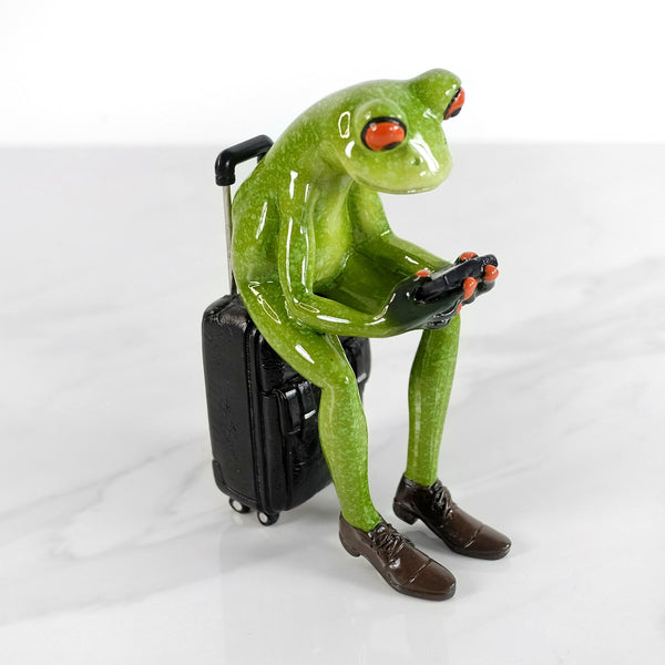 Grenouille décorative - Sur une valise